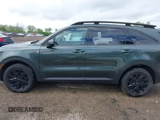 2023 Kia Sorento X-Line S z VIN 5XYRLDLC9PG230491, wystawiony jako IAAI lot #42243490 z przebiegiem 41 792 mil mil oraz . Historia ofert i sprzedaży dostępna na DreamBid. Obrazek 15.