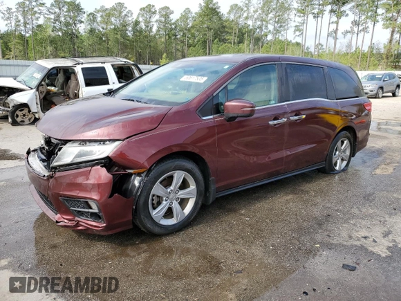 2018 Honda Odyssey EX-L z VIN 5FNRL6H75JB097041, wystawiony jako Copart lot #50617535 z przebiegiem 169 040 mil mil oraz Szkoda całkowita • Salvage title. Historia ofert i sprzedaży dostępna na DreamBid. Obrazek 1.