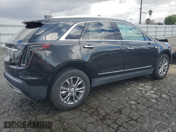 2023 Cadillac XT5 AWD Premium Luxury z VIN 1GYKNDRS6PZ144478, wystawiony jako Copart lot #45291295 z przebiegiem 45 910 mil mil oraz Nie do naprawy • Non repairable. Historia ofert i sprzedaży dostępna na DreamBid. Obrazek 3.