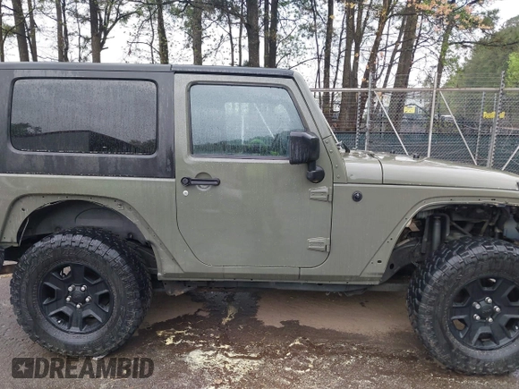 2007 Jeep Wrangler X with VIN 1J4FA24127L231409, listed as a IAAI auction lot 41971429 with 181,855 mi miles and . Bid and sale history available at carsss.com. Image 13.