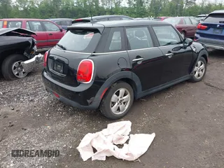 2020 MINI Hardtop 4 Door Cooper with VIN WMWXU7C04L2L58635, listed as a IAAI auction lot 42383785 with 27,160 mi miles and . Bid and sale history available at DreamBid. Image 4.