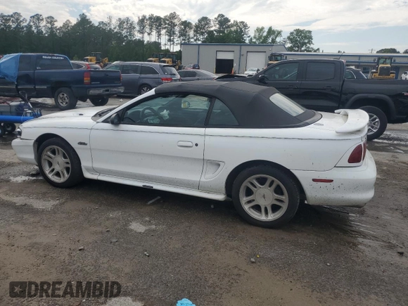 1998 Ford Mustang GT with VIN 1FAFP45X1WF263449, listed as a Copart auction lot 55851015 with 131,937 mi miles and Salvage title. Bid and sale history available at DreamBid. Image 2.