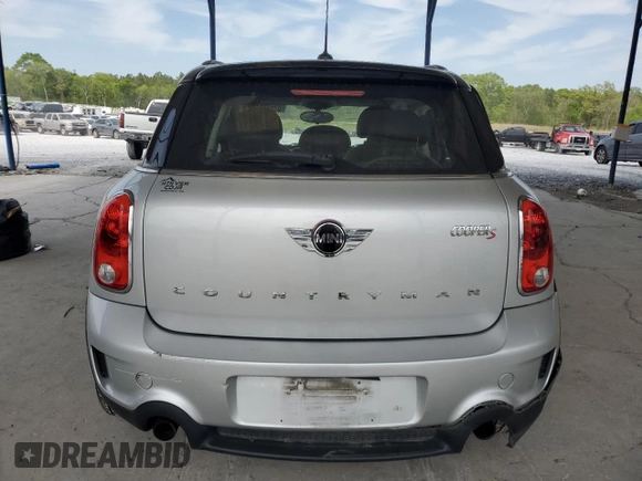 2014 MINI Countryman S with VIN WMWZC3C56EWP29211, listed as a Copart auction lot 52521145 with 91,396 mi miles and Salvage title. Bid and sale history available at DreamBid. Image 6.