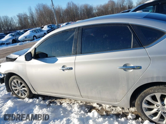 2018 Nissan Sentra SV z VIN 3N1AB7AP6JL655421, wystawiony jako IAAI lot #41407576 z przebiegiem 98 854 mil mil oraz . Historia ofert i sprzedaży dostępna na DreamBid. Obrazek 15.