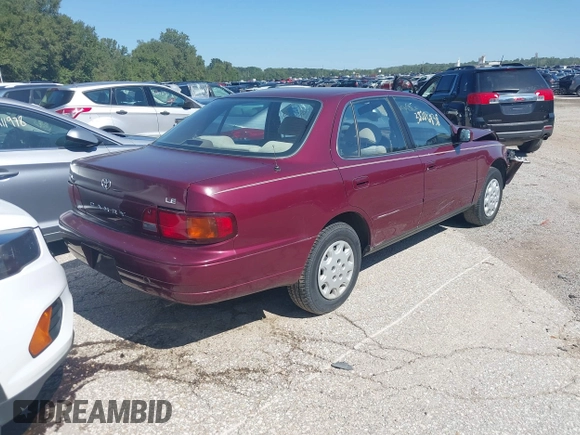 1996 Toyota Camry DX with VIN 4T1BG12K9TU691837, listed as a IAAI auction lot 40267369 with 36,383 mi miles. Bid and sale history available at carsss.com. Image 4.