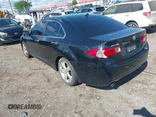 2009 Acura TSX with VIN JH4CU26659C011482, listed as a IAAI auction lot 42212079 with 243,119 mi miles. Bid and sale history available at carsss.com. Image 3.