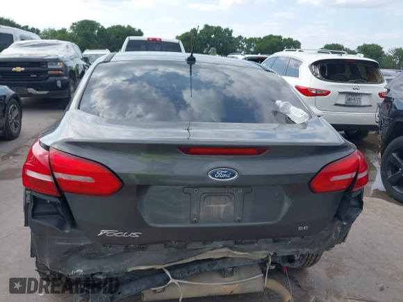 2018 Ford Focus SE with VIN 1FADP3F22JL295342, listed as a IAAI auction lot 42335881 with 77,464 mi miles and . Bid and sale history available at DreamBid. Image 17.