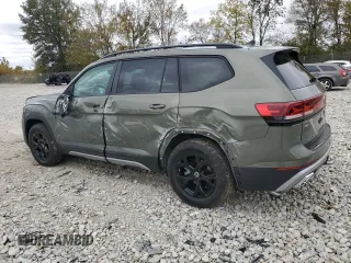 2024 Volkswagen Atlas Peak Edition SE with VIN 1V2CR2CA4RC575859, listed as a Copart auction lot 76310634 with 1,228 mi miles and Salvage title. Bid and sale history available at DreamBid. Image 2.