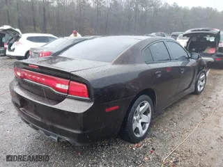 2014 Dodge Charger Police with VIN 2C3CDXAT3EH121356, listed as a IAAI auction lot 41028573 with 227,412 mi miles. Bid and sale history available at carsss.com. Image 4.