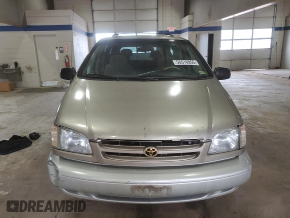 2000 Toyota Sienna LE with VIN 4T3ZF13C6YU210501, listed as a Copart auction lot 56510955 with 253,950 mi miles and Salvage title. Bid and sale history available at DreamBid. Image 5.