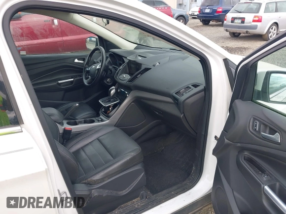 2014 Ford Escape SE with VIN 1FMCU9GX4EUB09341, listed as a IAAI auction lot 42398890 with 117,541 mi miles and . Bid and sale history available at DreamBid. Image 5.