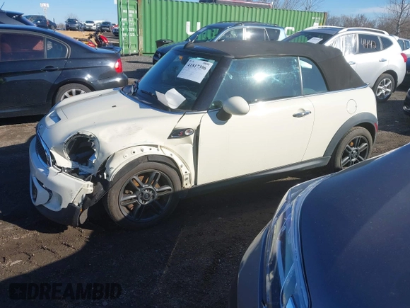 2011 MINI Convertible S with VIN WMWZP3C54BTX82748, listed as a IAAI auction lot 41817396 with 113,458 mi miles and . Bid and sale history available at DreamBid. Image 2.