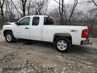 2010 Chevrolet Silverado 1500 LT with VIN 1GCSKSE39AZ126453, listed as a Copart auction lot 49468985 with 163,144 mi miles and Salvage Title. Bid and sale history available at carsss.com. Image 2.