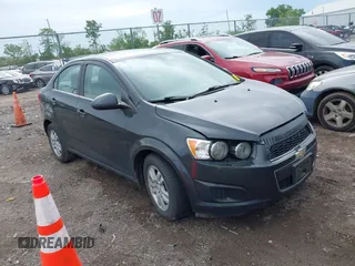 2014 Chevrolet Sonic LT with VIN 1G1JC5SH8E4235864, listed as a IAAI auction lot 42247217 with 150,057 mi miles and . Bid and sale history available at DreamBid. Image 1.