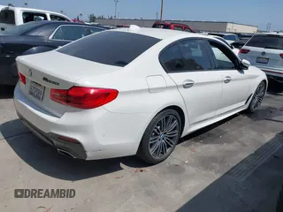 2018 BMW 5 Series 530i with VIN WBAJA5C5XJWA39179, listed as a IAAI auction lot 42380945 with 76,410 mi miles and . Bid and sale history available at DreamBid. Image 4.