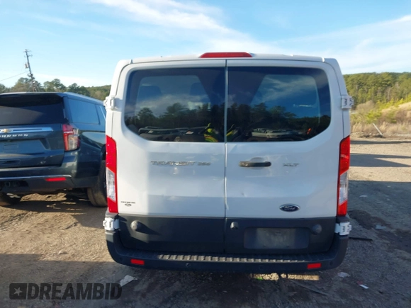 2020 Ford Transit Passenger XL z VIN 1FBAX2Y81LKA59805, wystawiony jako IAAI lot #41710846 z przebiegiem 89 840 mil mil oraz . Historia ofert i sprzedaży dostępna na DreamBid. Obrazek 16.