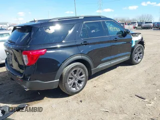 2023 Ford Explorer XLT with VIN 1FMSK8DH4PGC11989, listed as a IAAI auction lot 41845428 with 30,161 mi miles and . Bid and sale history available at carsss.com. Image 4.