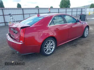 2012 Cadillac CTS Premium z VIN 1G6DS5E31C0104841, wystawiony jako IAAI lot #42292295 z przebiegiem 124 477 mil mil oraz . Historia ofert i sprzedaży dostępna na DreamBid. Obrazek 4.