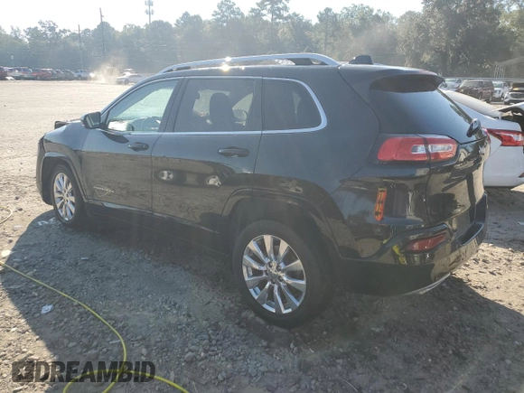2016 Jeep Cherokee Overland with VIN 1C4PJLJS9GW297855, listed as a Copart auction lot 74024414 with 163,578 mi miles and Salvage title. Bid and sale history available at DreamBid. Image 2.