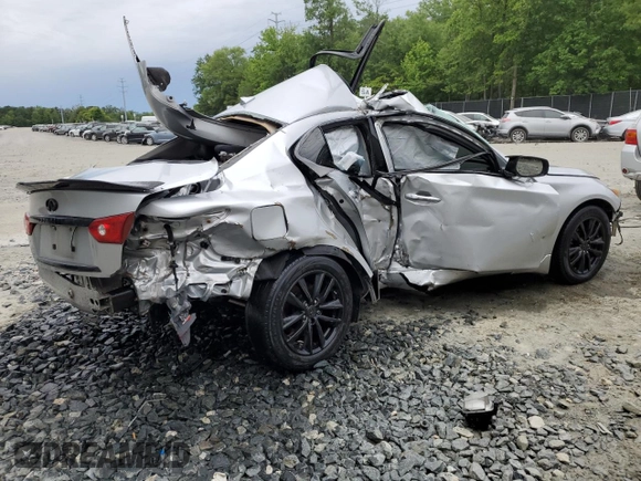 2014 Infiniti Q50 Premium with VIN JN1BV7ARXEM691878, listed as a Copart auction lot 56767475 with 151,257 mi miles and Clean title. Bid and sale history available at DreamBid. Image 3.