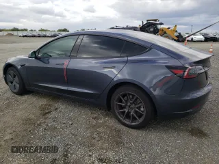 2023 Tesla Model 3 with VIN 5YJ3E1EA7PF395196, listed as a Copart auction lot 51260465 with 41,119 mi miles and Salvage title. Bid and sale history available at DreamBid. Image 2.