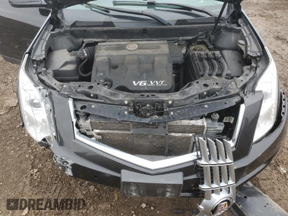 2014 Cadillac SRX Luxury Collection z VIN 3GYFNEE34ES685593, wystawiony jako Copart lot #52202805 z przebiegiem 139 869 mil mil oraz Szkoda całkowita • Salvage title. Historia ofert i sprzedaży dostępna na DreamBid. Obrazek 12.