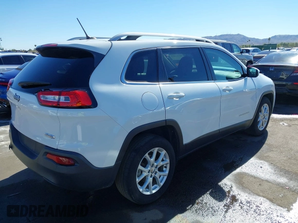 2016 Jeep Cherokee Altitude with VIN 1C4PJLCB6GW200348, listed as a IAAI auction lot 40791569 with 95,600 mi miles. Bid and sale history available at carsss.com. Image 4.