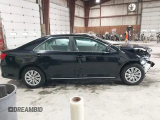 2012 Toyota Camry L z VIN 4T4BF1FK4CR258932, wystawiony jako IAAI lot #42138945 z przebiegiem 102 706 mil mil oraz . Historia ofert i sprzedaży dostępna na DreamBid. Obrazek 14.