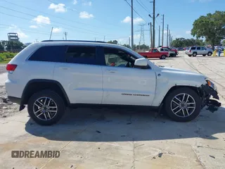 2020 Jeep Grand Cherokee Laredo with VIN 1C4RJFAG5LC258309, listed as a IAAI auction lot 42573007 with 68,980 mi miles and . Bid and sale history available at DreamBid. Image 13.