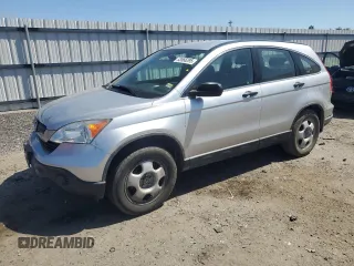 2009 Honda CR-V LX z VIN JHLRE483X9C007308, wystawiony jako Copart lot #53566295 z przebiegiem 122 280 mil mil oraz Szkoda całkowita • Salvage title. Historia ofert i sprzedaży dostępna na DreamBid. Obrazek 1.