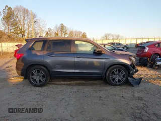 2020 Honda Passport EX-L with VIN 5FNYF7H55LB005906, listed as a IAAI auction lot 41322450 with 66,545 mi miles and . Bid and sale history available at DreamBid. Image 13.