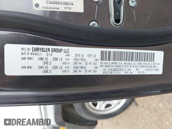 2014 Jeep Patriot Sport with VIN 1C4NJRBB2ED852114, listed as a IAAI auction lot 41521742 with 80,230 mi miles. Bid and sale history available at carsss.com. Image 9.