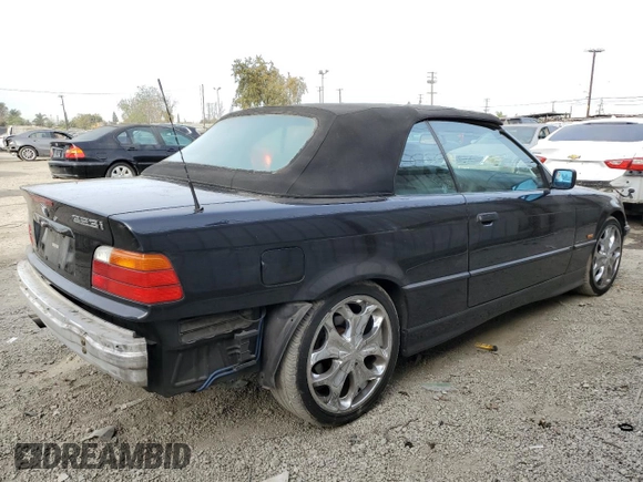 1999 BMW 3 Series 323icA with VIN WBABJ833XXEM22958, listed as a Copart auction lot 84696234 with 112,514 mi miles and Salvage Title. Bid and sale history available at carsss.com. Image 3.