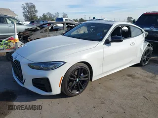 2021 BMW 4 Series M440i xDrive with VIN WBA13AR09MCF64044, listed as a IAAI auction lot 41391508 with 29,007 mi miles and . Bid and sale history available at DreamBid. Image 17.