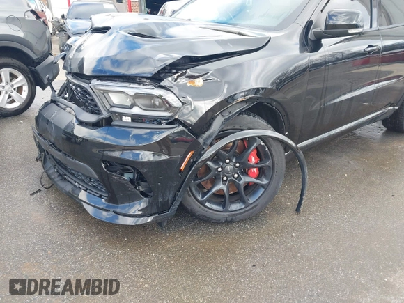 2023 Dodge Durango SRT Hellcat Premium with VIN 1C4SDJH90PC557375, listed as a IAAI auction lot 41328850 with 30,697 mi miles and . Bid and sale history available at DreamBid. Image 19.