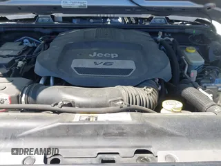 2015 Jeep Wrangler Sport with VIN 1C4AJWAG3FL696988, listed as a IAAI auction lot 41999036 with 79,064 mi miles. Bid and sale history available at carsss.com. Image 10.