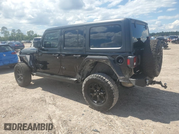 2021 Jeep Wrangler Unlimited Willys with VIN 1C4HJXDN0MW859686, listed as a Copart auction lot 56657725 with 49,984 mi miles and Salvage title. Bid and sale history available at DreamBid. Image 2.
