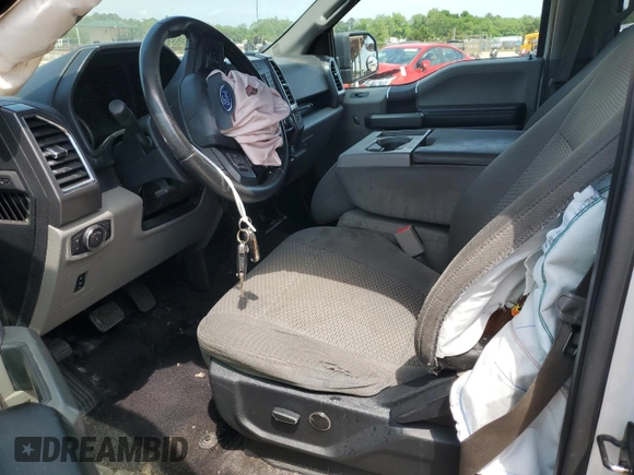 2016 Ford F-150 XLT with VIN 1FTEW1EF0GFC00343, listed as a Copart auction lot 56992855 with 166,280 mi miles and Salvage title. Bid and sale history available at DreamBid. Image 7.