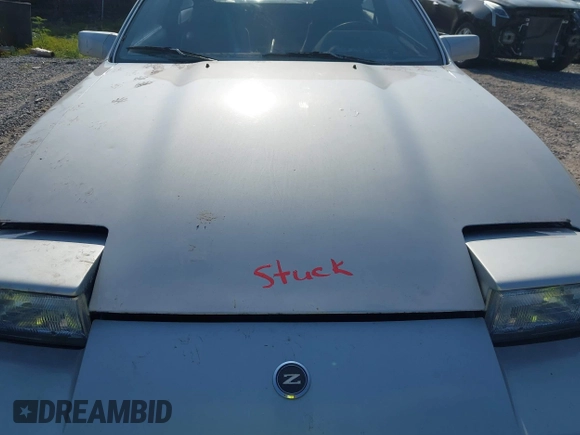 1987 Nissan 300ZX z VIN JN1HZ14S6HX214121, wystawiony jako IAAI lot #42204712 z przebiegiem 218 637 mil mil oraz . Historia ofert i sprzedaży dostępna na DreamBid. Obrazek 10.