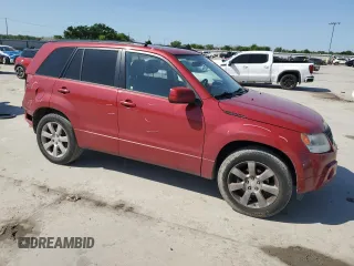 2011 Suzuki Grand Vitara Limited z VIN JS3TE0D72B4100054, wystawiony jako Copart lot #52535705 z przebiegiem 131 468 mil mil oraz Szkoda całkowita • Salvage title. Historia ofert i sprzedaży dostępna na DreamBid. Obrazek 4.