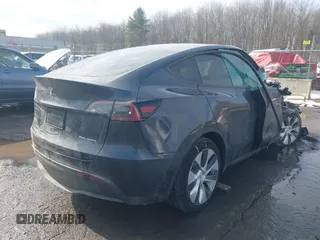 2024 Tesla Model Y Long Range with VIN 7SAYGDEE8RF084936, listed as a IAAI auction lot 41615104 with 14,622 mi miles. Bid and sale history available at carsss.com. Image 4.