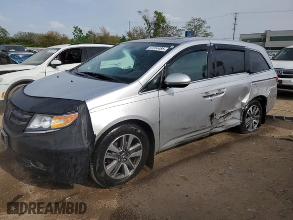 2014 Honda Odyssey Touring with VIN 5FNRL5H93EB034263, listed as a Copart auction lot 57254485 with 150,084 mi miles and Salvage title. Bid and sale history available at DreamBid. Image 1.