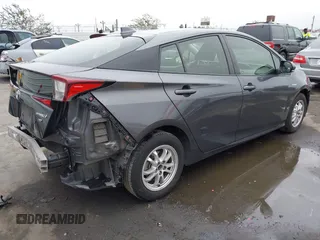 2021 Toyota Prius L Eco with VIN JTDKAMFU8M3144391, listed as a IAAI auction lot 42477718 with 314,346 mi miles and . Bid and sale history available at DreamBid. Image 4.