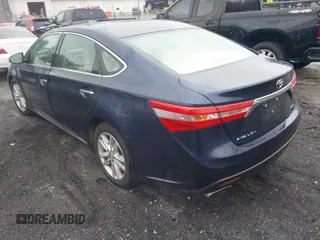 2014 Toyota Avalon Limited z VIN 4T1BK1EB5EU098361, wystawiony jako IAAI lot #42317290 z przebiegiem 243 175 mil mil oraz . Historia ofert i sprzedaży dostępna na DreamBid. Obrazek 3.