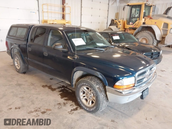 2003 Dodge Dakota SLT with VIN 1D7HL48N63S177233, listed as a IAAI auction lot 42167711 with 163,511 mi miles and . Bid and sale history available at carsss.com. Image 1.