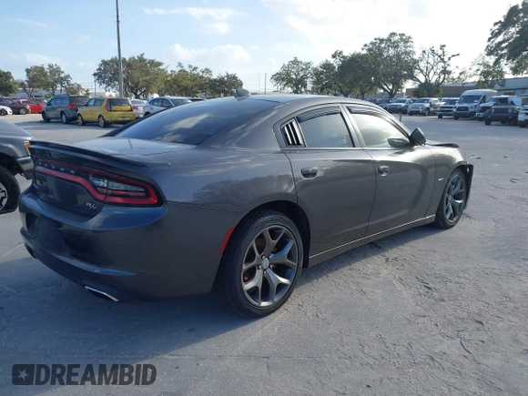 2015 Dodge Charger RT with VIN 2C3CDXCT9FH819971, listed as a IAAI auction lot 40592010 with 154,386 mi miles and . Bid and sale history available at DreamBid. Image 4.