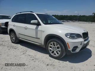2012 BMW X5 35i z VIN 5UXZV4C54CL990840, wystawiony jako Copart lot #57715245 z przebiegiem 166 192 mil mil oraz Szkoda całkowita • Salvage title. Historia ofert i sprzedaży dostępna na DreamBid. Obrazek 4.