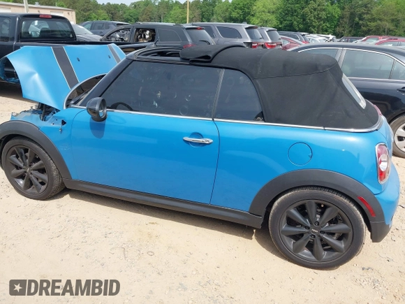 2013 MINI Convertible S with VIN WMWZP3C53DT705016, listed as a IAAI auction lot 42155802 with Not provided miles and . Bid and sale history available at DreamBid. Image 14.