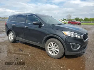 2016 Kia Sorento LX z VIN 5XYPGDA33GG148884, wystawiony jako Copart lot #55864485 z przebiegiem 129 331 mil mil oraz Szkoda całkowita • Salvage title. Historia ofert i sprzedaży dostępna na DreamBid. Obrazek 4.