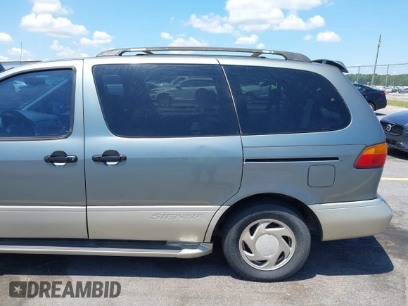 1999 Toyota Sienna LE z VIN 4T3ZF13C4XU118561, wystawiony jako IAAI lot #42536325 z przebiegiem 273 336 mil mil oraz . Historia ofert i sprzedaży dostępna na DreamBid. Obrazek 13.